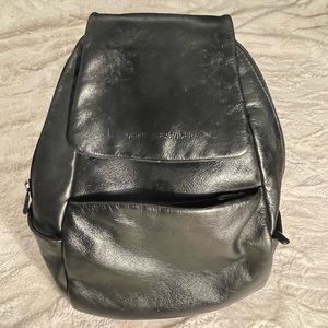 Derek Alexander black small sling backpack